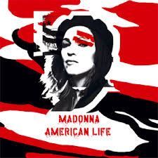 Album cover featuring a stylized black and white portrait of a woman with long hair, set against a red and black abstract background. The text 'MADONNA AMERICAN LIFE' is prominently displayed.